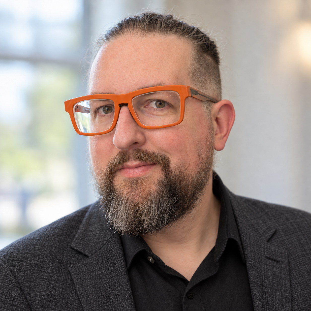 Christian Pantle, wearing orange glasses